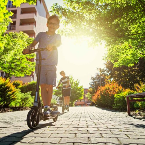 children on scooters