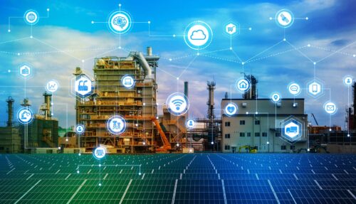 factory with solar panels in front and a digital overlay