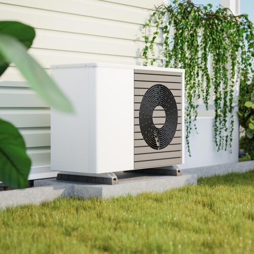 heat pump installed beside a home
