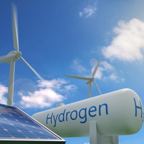 hydrogen tank with wind turbines behind