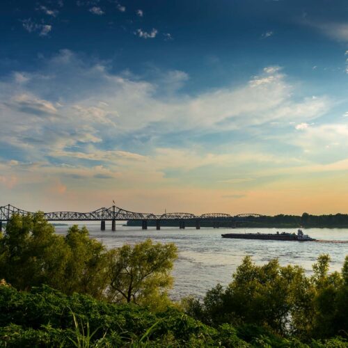 Mississippi river with boat and bridge