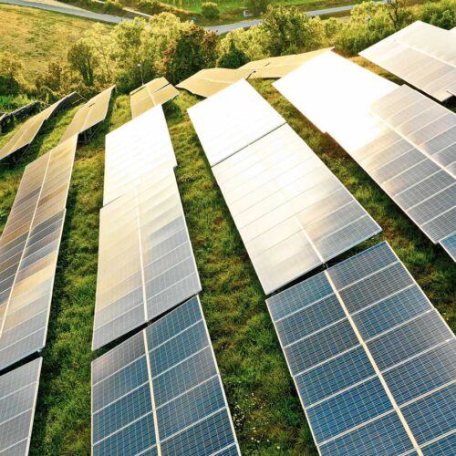 solar panels on rolling hills